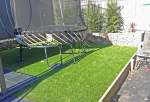 Residential Back Yard - Synthetic Grass Lay Installed 6 months earlier - Happy Customer!