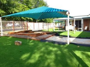 Synthetic Grass Melbourne - laying synthetic grass at a local kindergarten